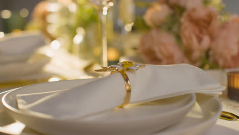 Close-Up-Of-Napkin-In-Ring-On-Table-Set-For-Meal-At-Wedding-Reception-In-Restaurant-5
